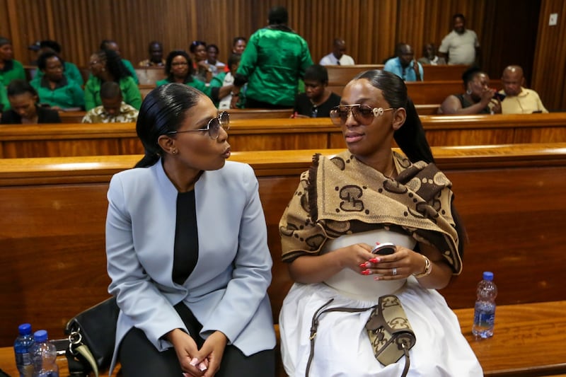 Pastor Timothy Omotoso’s co-accused in his human trafficking trial, Lusanda Sulani, left, and Zukiswa Sitho, in the Gqeberha high court on Wednesday
